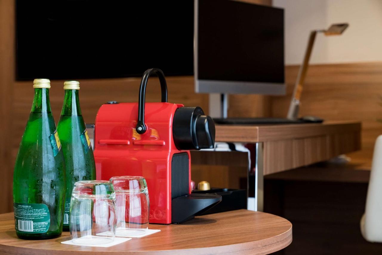 Radisson Blu Hotel, Jeddah Al Salam Exterior photo A Nespresso coffee machine in a hotel room