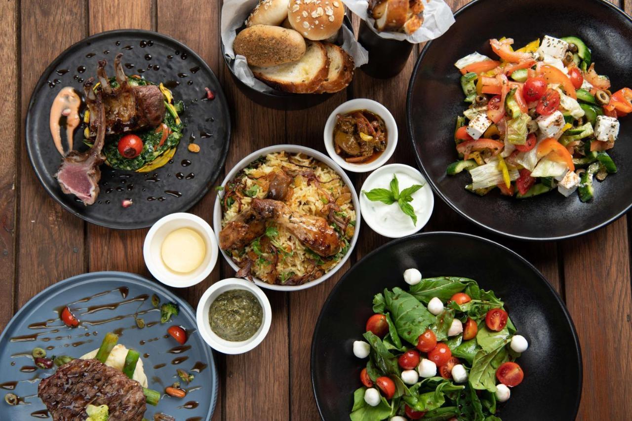 Radisson Blu Hotel, Jeddah Al Salam Exterior photo A selection of dishes from the restaurant